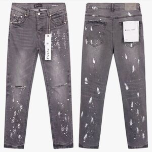 Men’s luxury Purple brand jeans. Slim fit gray denim with paint splatter.